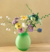 Colorful Crochet Flowers and Glass Vase
