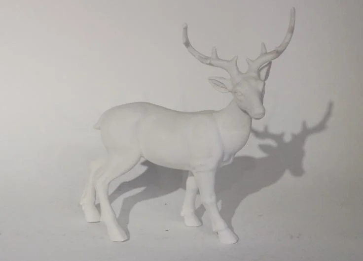Porcelain Deer Figurine